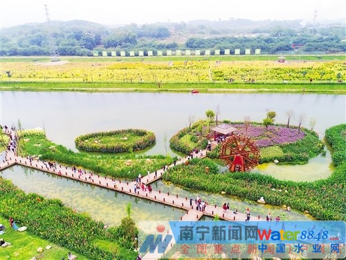 如今的那考河濕地公園清水潺潺、鳥語花香,各方游客絡(luò)繹不絕 記者 賴有光 攝